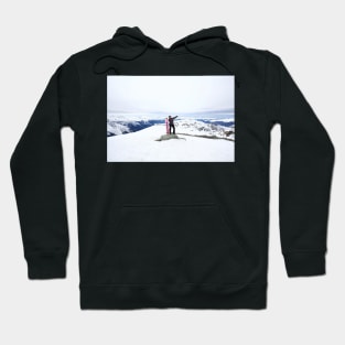 Snowboarding woman on snow Long Hoodie